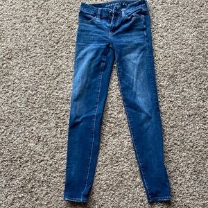 Dark blue stretchy begging skinny jeans